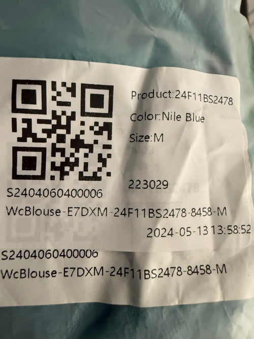 NWT Halara Batwing short sleeve long line shirt in Nile Blue M